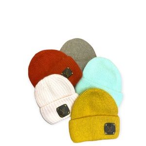 Beanie knit hat made of luxurious rabbit/angora hair and Louis Vuitton accent.